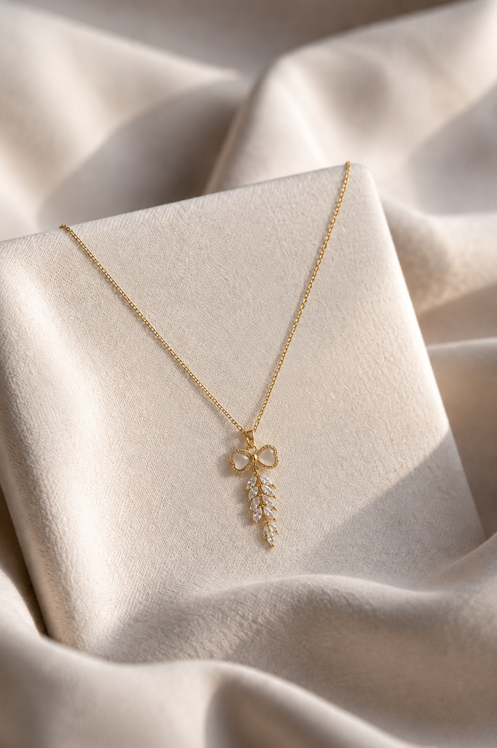 Ivory Bow Crystal Necklace